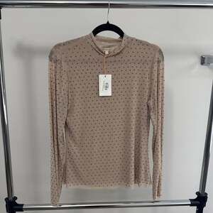 Subtle Shine Embellished Mesh Top in Beige – ,